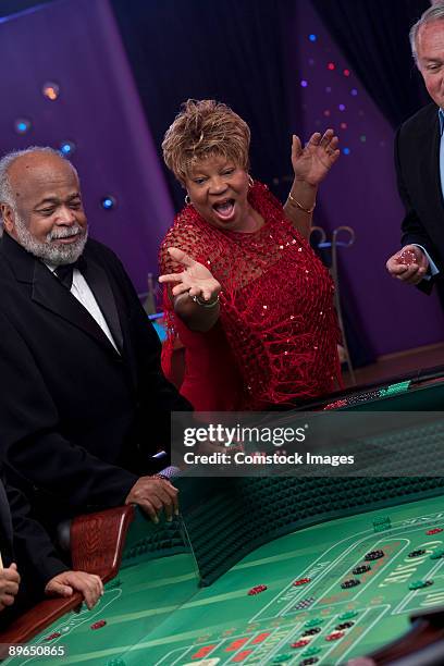 older couple gambling - casino tables hands stock pictures, royalty-free photos & images