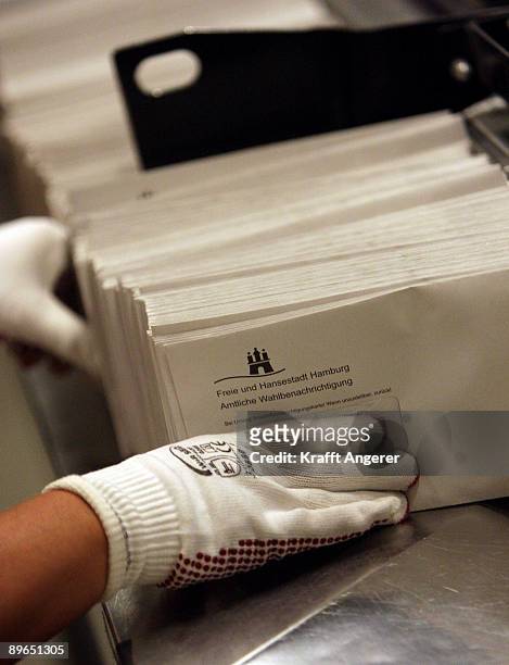 Employee sorts voting cards at the delivery post office on August 7, 2009 in Hamburg, Germany. Today starts the dispath by post of 1.26 million...