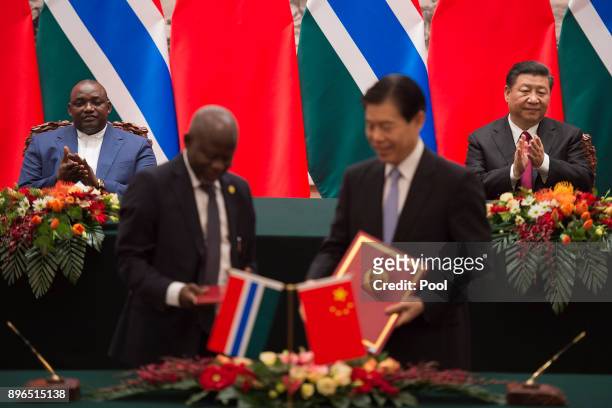 Gambian President Adama Barrow and Chinese President Xi Jinping during a signing ceremony at the Great Hall of the People on December 21, 2017 in...