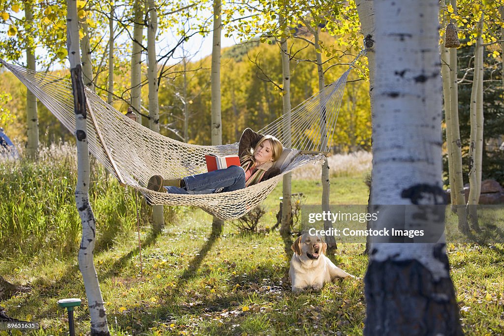 Woman laying in hammock