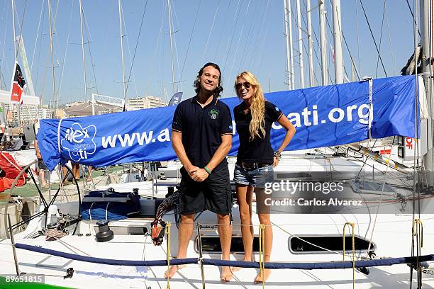 Spanish actress Carolina Cerezuela and her boyfriend Carlos Moya pose on board of "Alex Rumbo a Ti" during 28th Copa del Rey Audi Sailing Cup on...