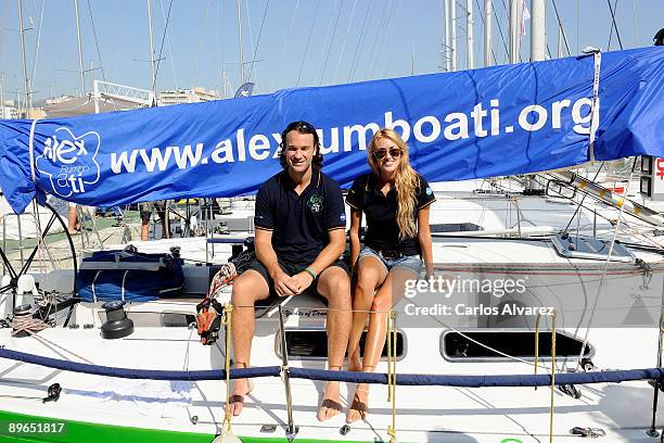 Spanish actress Carolina Cerezuela and her boyfriend Carlos Moya pose on board of "Alex Rumbo a Ti" during 28th Copa del Rey Audi Sailing Cup on...