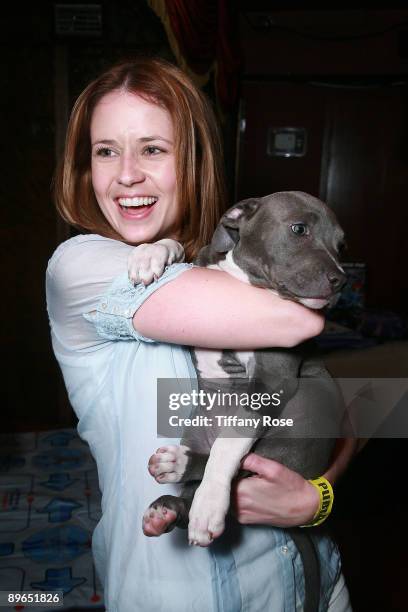 Actress Jenna Fischer poses with a puppy from Tails of the City Animal Rescue at Melanie Segal's Teen Choice Lounge Presented by Rocket Dog at The...