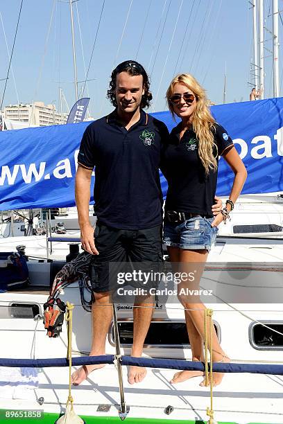 Spanish actress Carolina Cerezuela and her boyfriend Carlos Moya pose on board of "Alex Rumbo a Ti" during 28th Copa del Rey Audi Sailing Cup on...