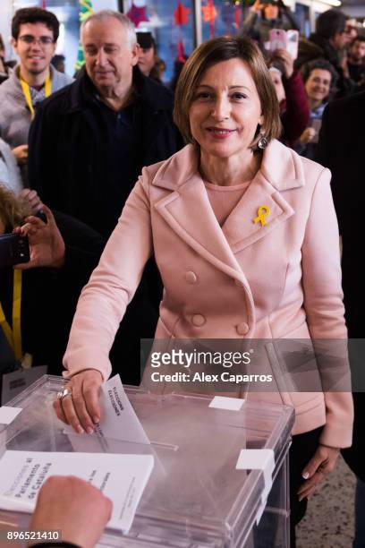 President of Catalan Parliament and 'Esquerra Republicana de Catalunya' - ERC candidate Carme Forcadell casts her ballot for the Catalan regional...