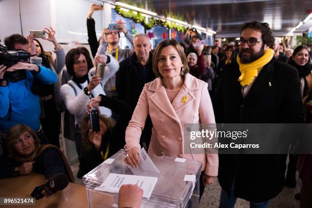 President of Catalan Parliament and 'Esquerra Republicana de Catalunya' - ERC candidate Carme Forcadell casts her ballot for the Catalan regional...