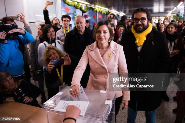 President of Catalan Parliament and 'Esquerra Republicana de Catalunya' - ERC candidate Carme Forcadell casts her ballot for the Catalan regional...