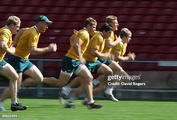 The Wallabies take part in sprint training during the Wallabies captain's run at Newlands Stadium on August 7, 2009 in Cape Town, South Africa.