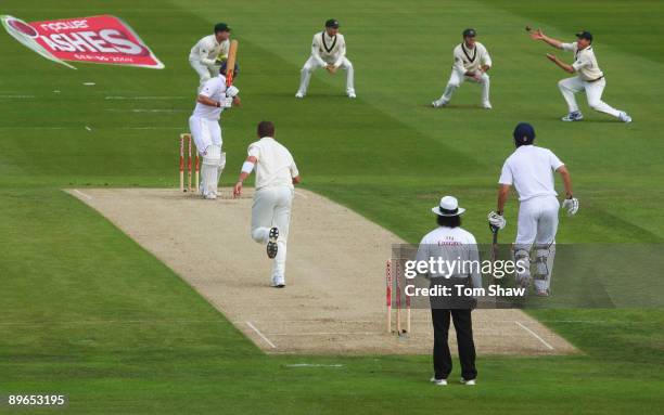 Marcus North of Australia takes the catch to dismiss Andrew Strauss of England off the bowling of Peter Siddle of Australia during day one of the...