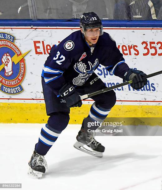 Jansen Harkins of the Manitoba Moose skates up ice against the Toronto Marlies during AHL game action on December 17, 2017 at Ricoh Coliseum in...