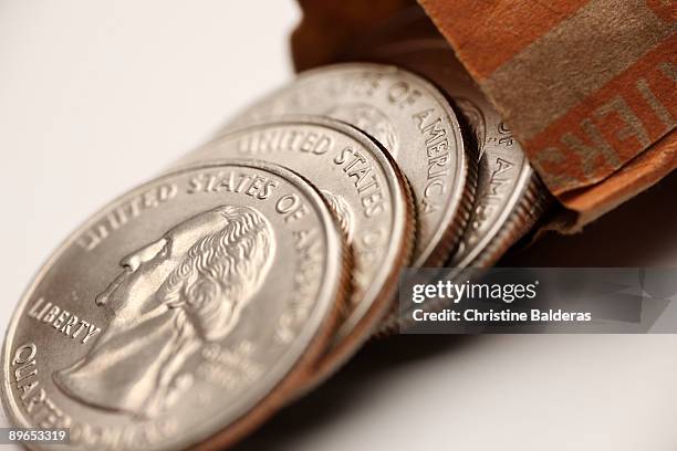 Quarters Falling Quarters Falling Photos and Premium High Res Pictures - Getty Images