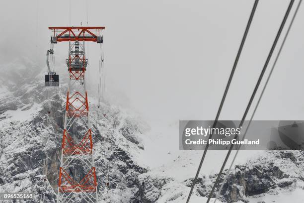 An aerial tramway of the new "Eibsee Seilbahn" cable car connection is seen on its way to the Zugspitze peak on the system's inauguration day on...