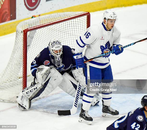 Kerby Rychel of the Toronto Marlies screens goalie Michael Hutchinson of the Manitoba Moose during AHL game action on December 17, 2017 at Ricoh...