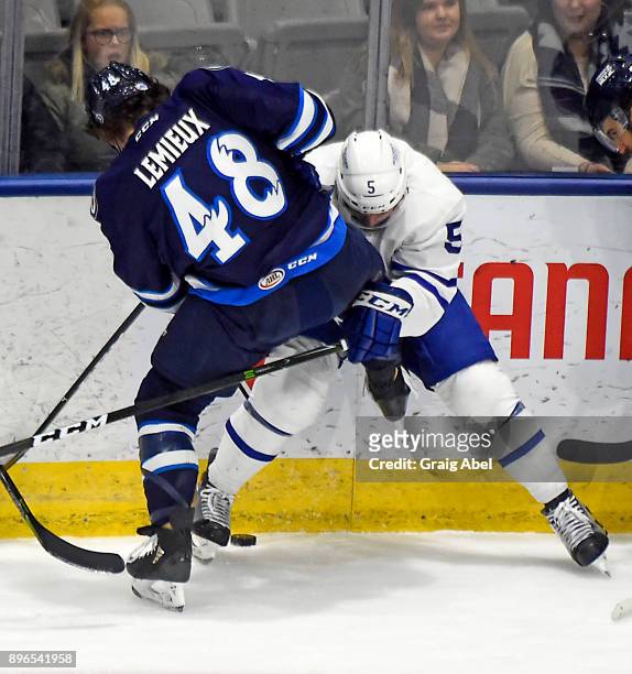 Vincent LoVerde of the Toronto Marlies ties up Brendan Lemieux of the Manitoba Moose during AHL game action on December 17, 2017 at Ricoh Coliseum in...