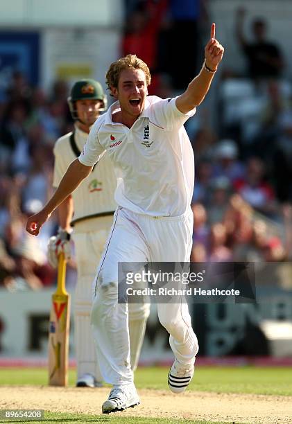 Stuart Broad of England celebrates taking the wicket of Michael Hussey during day one of the npower 4th Ashes Test Match between England and...