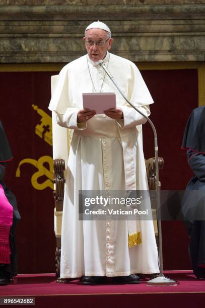 Pope Francis holds his speech as he exchanges Christmas greetings with the Roman curia at the Clementina Hall Vatican on December 21, 2017 in Vatican...