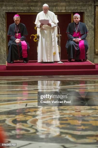 Pope Francis holds his speech as he exchanges Christmas greetings with the Roman curia at the Clementina Hall Vatican on December 21, 2017 in Vatican...