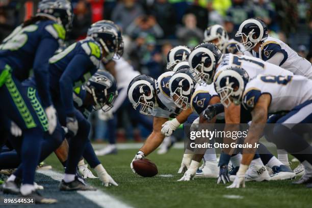 Center John Sullivan of the Los Angeles Rams addresses the ball against the Seattle Seahawks at CenturyLink Field on December 17, 2017 in Seattle,...