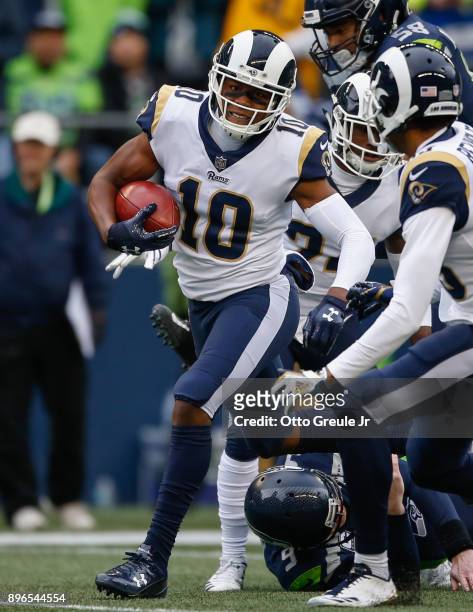 Punt returner Pharoh Cooper of the Los Angeles Rams rushes against the Seattle Seahawks during the first quarter at CenturyLink Field on December 17,...