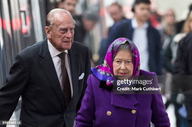 Her Majesty Queen Elizabeth II and Prince Philip, Duke of Edinburgh arrive at King's Lynn Station on December 21, 2017 in King's Lynn, England ahead...