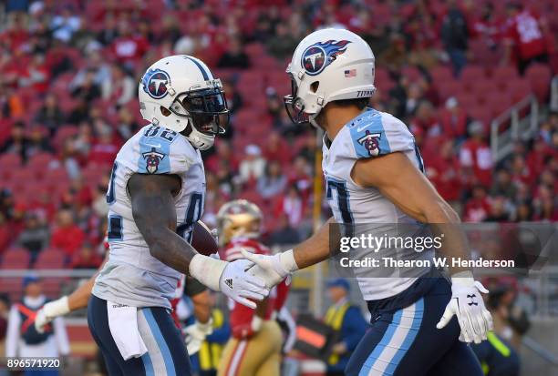 Delanie Walker and Eric Decker of the Tennessee Titans celebrates after Walker caught a touchdown pass against the San Francisco 49ers during their...