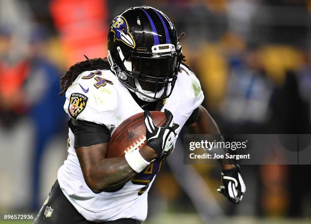 Alex Collins of the Baltimore Ravens in action during the game against the Pittsburgh Steelers at Heinz Field on December 10, 2017 in Pittsburgh,...