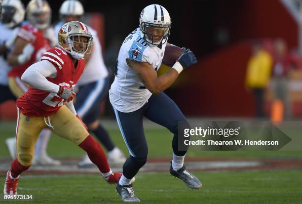 Rishard Matthews of the Tennessee Titans runs with the ball after catching a pass against the San Francisco 49ers during their NFL football game at...