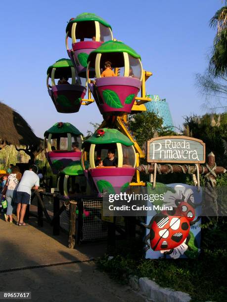 Seville, Andalusia . Isla Magica Fairground. Merry go round.