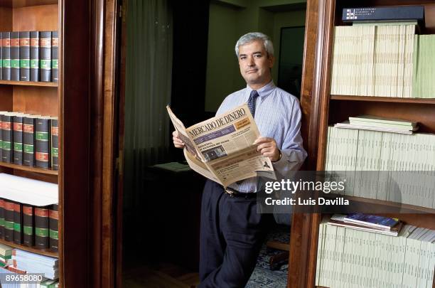 Luis Pinedo President of Ausbank The president of the Association of Users of Bank Services in their office with an economic newspaper in the hands