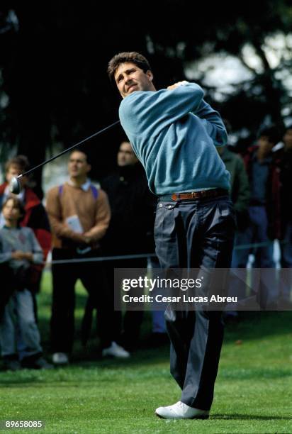 Jose Maria Olazabal The golf player throwing the ball in a competition