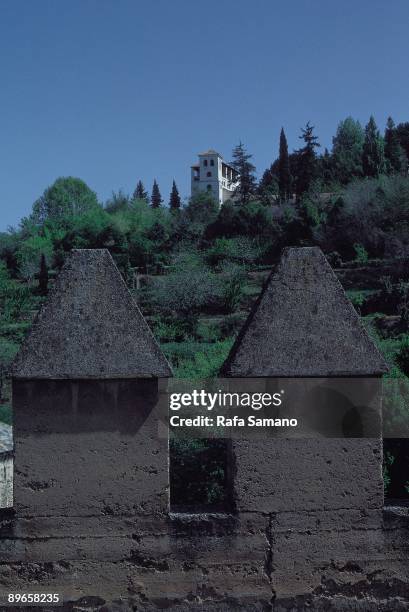 The Alhambra of Granada. Genaralife Palace and Gardens saw from the tower of La Alcazaba.