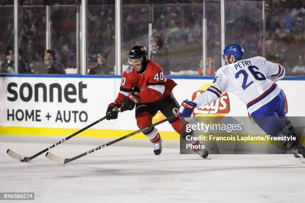 Gabriel Dumont of the Ottawa Senators skates against Jeff Petry of the Montreal Canadiens at the 2017 Scotiabank NHL 100 Classic at Lansdowne Park on...