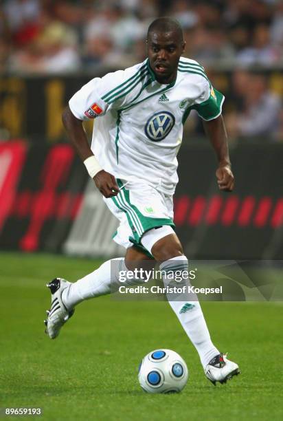 Grafite of Wolfsburg runs with the ball during the Bundesliga match between VfL Wolfsburg and VfB Stuttgart at Volkswagen Arena on August 7, 2009 in...