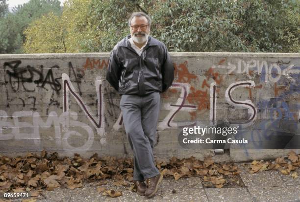 Fernando Savater, philosopher Beside a graffitti wall