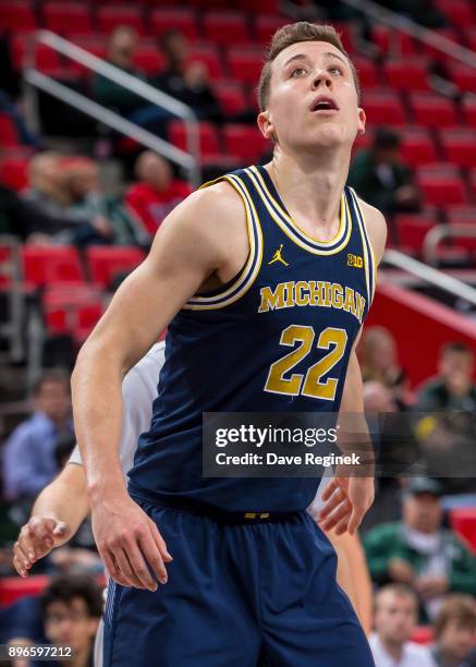 Duncan Robinson of the Michigan Wolverines looks down court against the Detroit Titans during game one of the Hitachi College Basketball Showcase at...