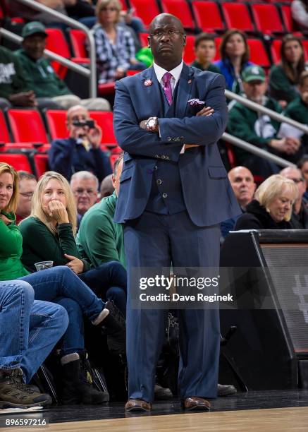 Head Coach Bacari Alexander of the Detroit Titans watches the play from the sidelines against the Michigan Wolverines during game one of the Hitachi...