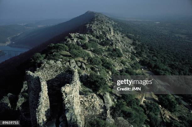 Natural Park of Montfragüe. Caceres "Panoramic view of this natural area of great ecological value. In first term, the ruins of a castle on the...