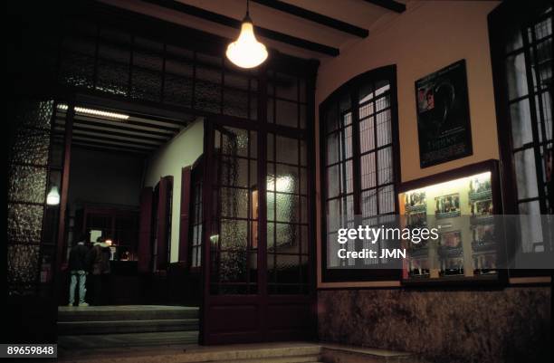 Cinema of Torroella de Montgri. People buy tickets in the box office of the cinema of Torroella de Montgria, Gerona province.