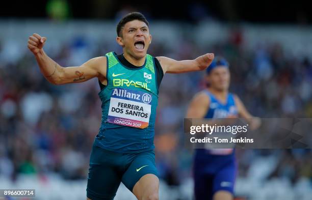 Petrucio Ferreira dos Santos of Brazil celebrates winning gold in a world record in the men's 200m T47 final during the World Para Athletics...