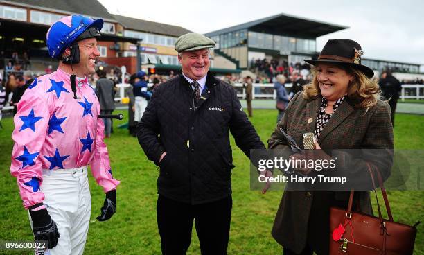 Jockey Robbie Power chats with Trainer Colin Tizzard and Christine Thomas, Owner of On Demand prior to his ride at Exeter Racecourse on December 21,...