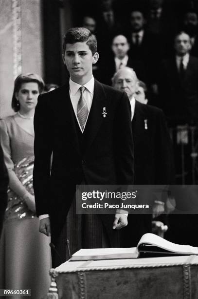 Prince Felipe de Borbon´s oath of the Constitution The Prince of Asturias swears the Constitution, behind, his grandfather, Don Juan de Borbon, and...