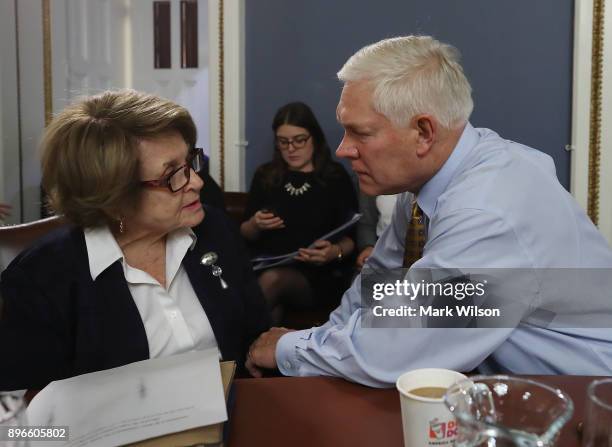 House Rules Committee Chairman Pete Sessions talks with Rep. Louise Slaughter as negotiations continue on funding the government to avert a shutdown...