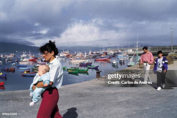 Finisterre seaport People walk on the Finisterre Seaport, A Coruna province