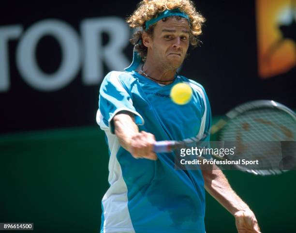 Gustavo Kuerten of Brazil in action during the Australian Open Tennis Championships at Flinders Park in Melbourne, Australia circa January 2003.