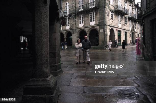 Calle de As Ruas, Santiago de Compostela View of a couple walking on the As Ruas. Santiago de Compostales, La Coruna province