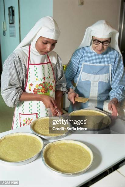 Nuns making cakes Two nuns make cakes in Santa Clara´s monastery. Burgos