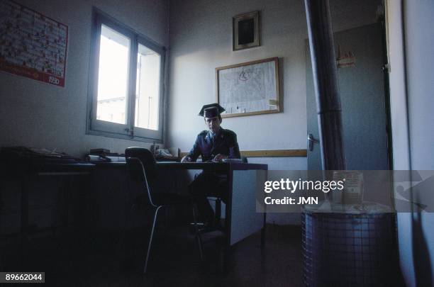 Civil guard in the office civil guard is sat down in the office of the barracks of Llivia. Lerida province