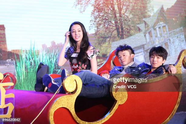 Actress Dilraba Dilmurat, actor Dong Zijian and actor Wang Junkai attend the fans meeting of film 'Namiya' on December 21, 2017 in Beijing, China.