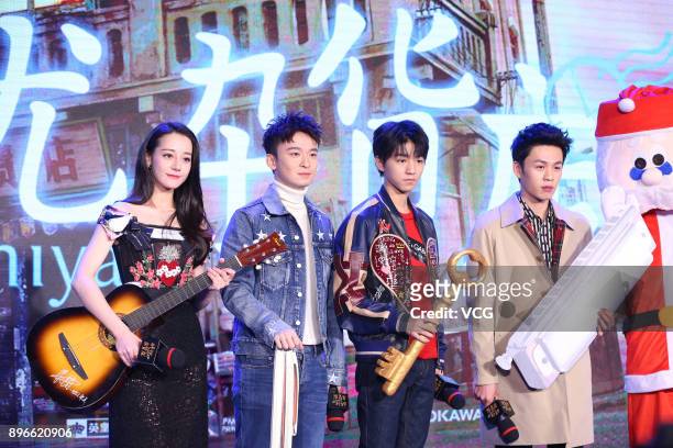 Actress Dilraba Dilmurat , actor Dong Zijian and actor Wang Junkai attend the fans meeting of film 'Namiya' on December 21, 2017 in Beijing, China.