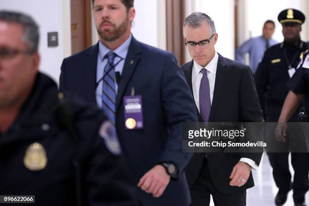 Federal Bureau of Investigation Deputy Director Andrew McCabe is escorted by U.S. Capitol Police before a meeting with members of the Oversight and...